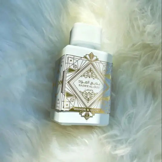 Badee Al Oud - Honor & Glory by Lattafa is a unisex Eau de Parfum with 100 ml capacity, featuring rich oud, warm spices, and long-lasting fragrance ideal for special events or daily wear, embodying luxury and sophistication.